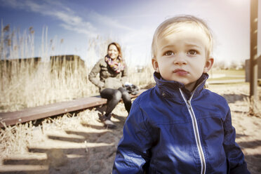 Germany, Oberhausen, toddler with mother on playground - GDF000698