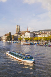 Switzerland, Zurich, view of city with tourboat on Limmat in the foreground - WD003030
