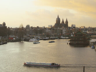 Amsterdam, Netherlands, Oude Kerk (old church), Sea Palace chinese restaurant, tourist boat - SBDF002755