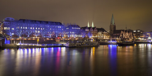 Germany, Bremen, view to lighted historic old town at night - WIF001624