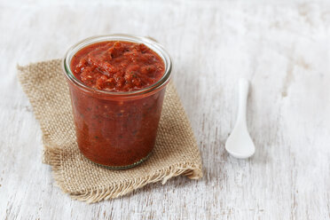 Glass of home-made pizza sauce - EVGF001446