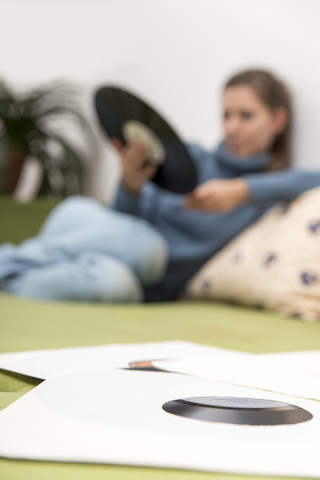 Woman looking at old records stock photo