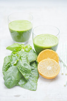 Two glasses of spinach basil clementine smoothie - CZF000194