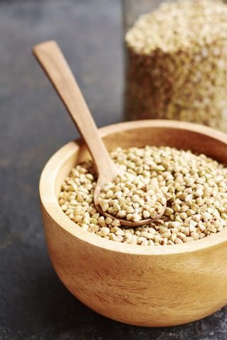 Hemp seeds in a wooden bowl stock photo