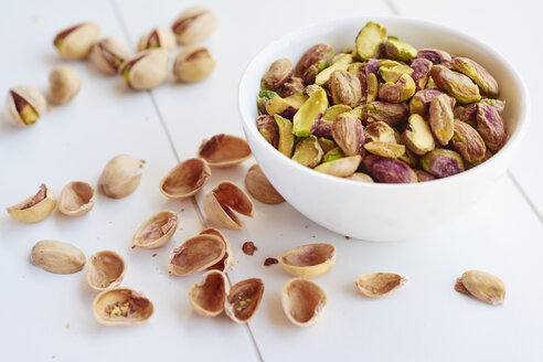 Shelled pistachio nuts in a small bowl - HAWF000767