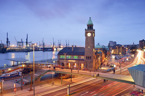 Germany, Hamburg, St. Pauli Landing Stages with gauge tower at blue hour stock photo
