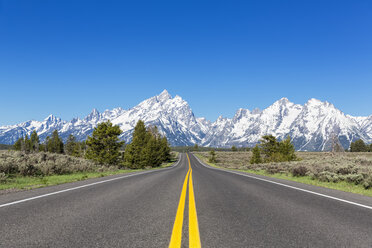 USA, Wyoming, Grand Teton National Park, Teton Range, Cathedral Group, Teewinot Mountain, Grand Teton and Mount Owen with road - FOF008099