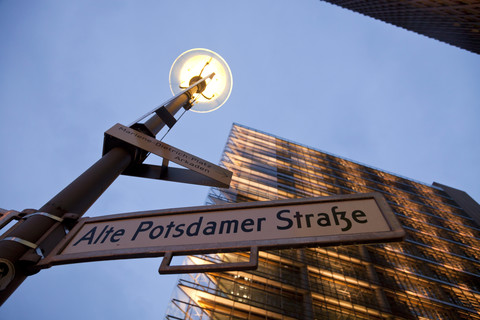 Germany, Berlin, street sign at Potsdamer Platz by night stock photo