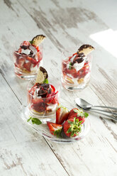 Dessert in glasses with yoghurt, curd, strawberries and chocolate marshmallow - MAEF010251