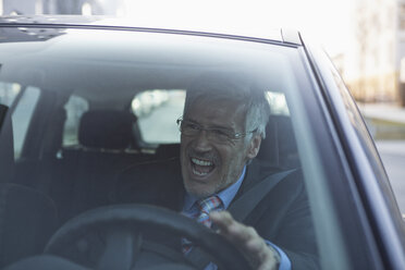 Angry businessman in his car - RBF002652