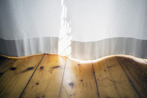 Morning sunlight on a white curtain stock photo