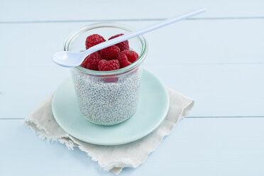 Chia pudding made of chia seeds with almond milk and raspberries - ECF001800