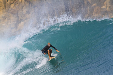 Indonesia, Lombok Island, surfing man - KNTF000012
