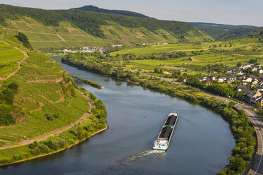 Germany, Rhineland-Palatinate, Moselle valley, cargo ship passing Bremm - RUNF000009