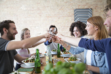 Happy friends eating together - FKF000997