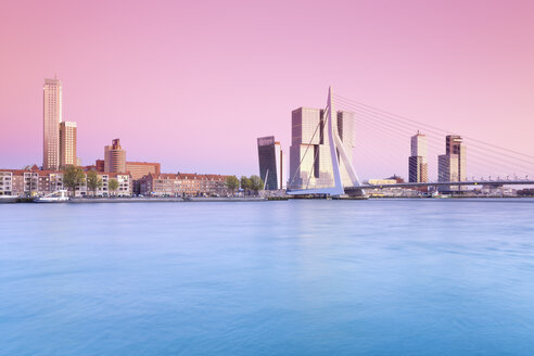 Netherlands, County of Holland, Rotterdam, View to Erasmus bridge and the skyline in the evening - MSF004521
