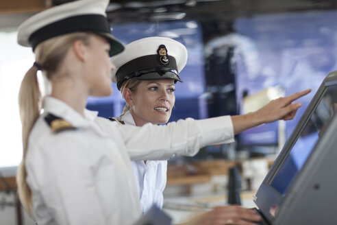 Two female deck officers on bridge - ZEF005492