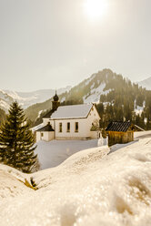 Austria, Kleinwalsertal, Baad, St Martin's Church in winter - EGBF000011