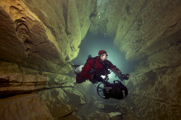 France, Lot, cave diver in the Emergence du Ressel - YRF000076