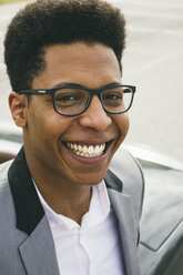 Young black man wearing glasses, portrait - ABZF000041