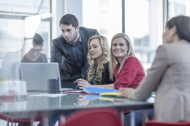 Business people with laptop in a meeting - ZEF005082