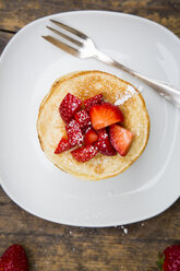 Stack of pancakes with strawberry sauce and strawberries - LVF003374