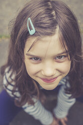 Portrait of smiling girl with hairpin - LVF003385