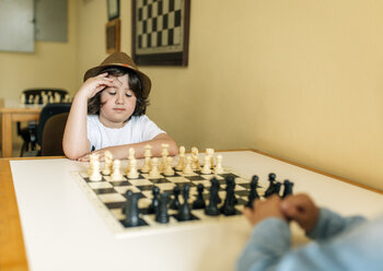 Boy playing chess - MGOF000224