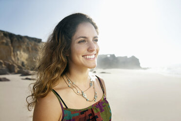South Africa, smiling woman on the beach - TOYF000659