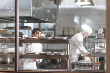 Chefs working in restaurant kitchen - ZEF005405