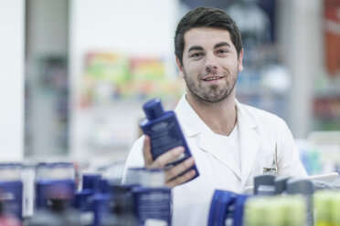 Pharmacist taking stock at drugstore - ZEF005889