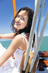 Brunette young woman on a sailing ship - TOYF000842