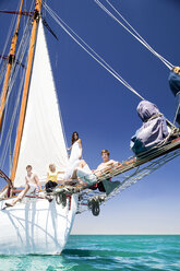 Friends on bow of a sailing ship - TOYF000855