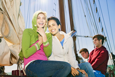 Happy friends on a sailing ship - TOYF000876