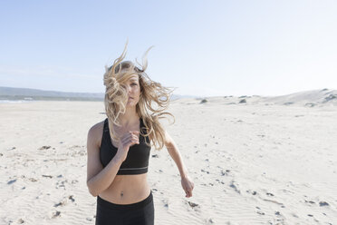 South Africa, Cape Town, two women jogging on the beach - ZEF005198