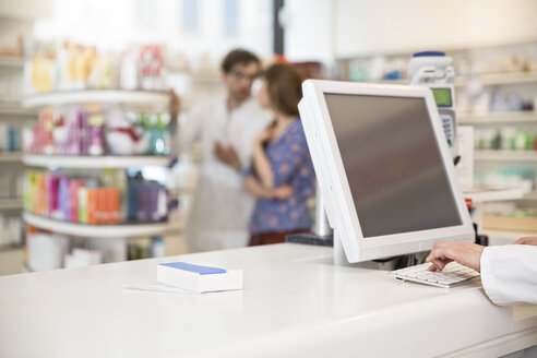 Prescription and drug lying on counter of a pharmacy - FKF001098