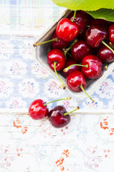 Organic cherries in bowl - LVF003438