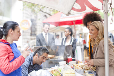 People buying food at city market - ZEF006568