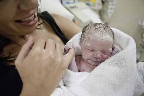 Mother with newborn baby stock photo