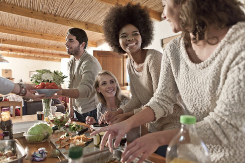 Friends preparing meal together - ZEF006282