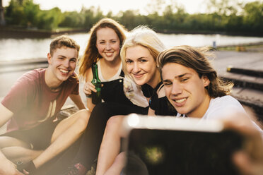 Friends taking a selfie with beer bottles - GCF000083