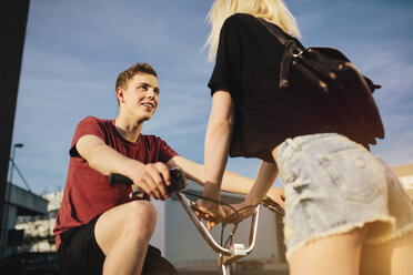 Young couple with BMX bicycle - GCF000090