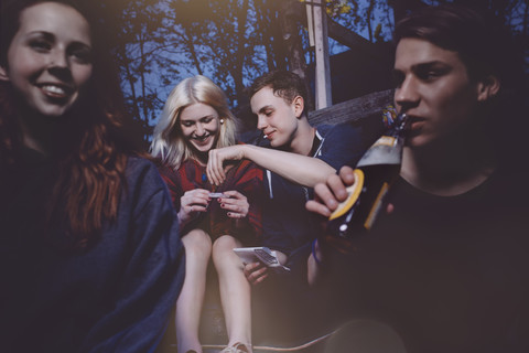 Friends hanging out together in the evening stock photo