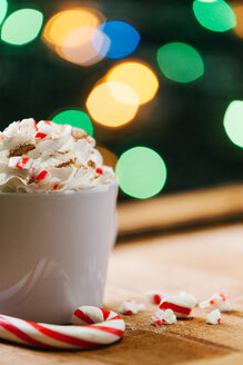 Cup of cappuccino with whipped cream and candy cane - BZF000168