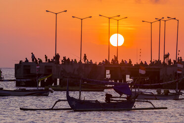 Indonesia, Bali, Jimbaran, Sunset at the ocean - KNTF000049