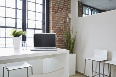 Laptop on desk in modern office - PDF001063