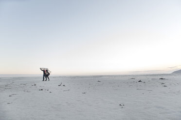 South Africa, Cape Town, senior couple walking on the beach - ZEF005665