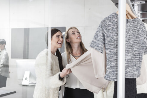 Two women shopping for clothes - ZEF006689