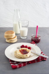 Toasties with strawberry raspberry jam and glass of milk - MYF001041