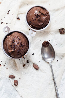 Cups of homemade chocolate icecream sprinkled with cacao nibs - SBDF002065